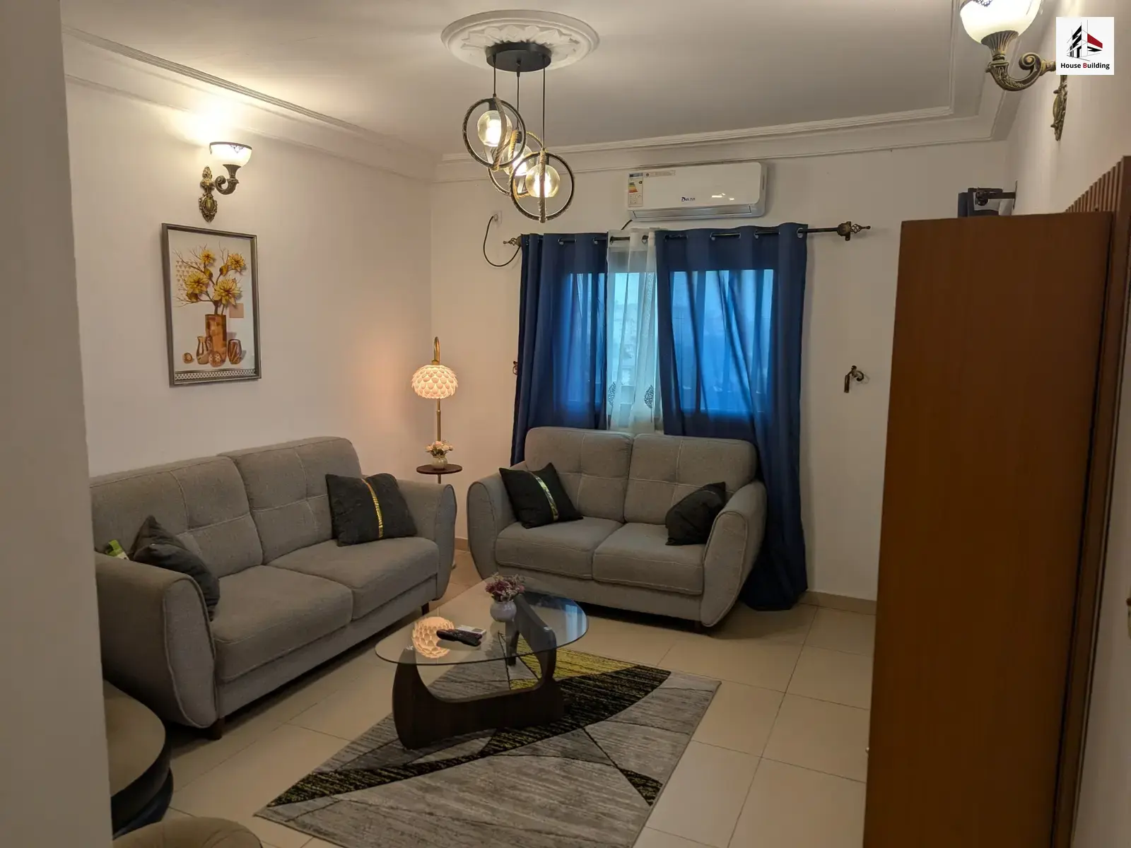 Salon climatisé du studio meublé